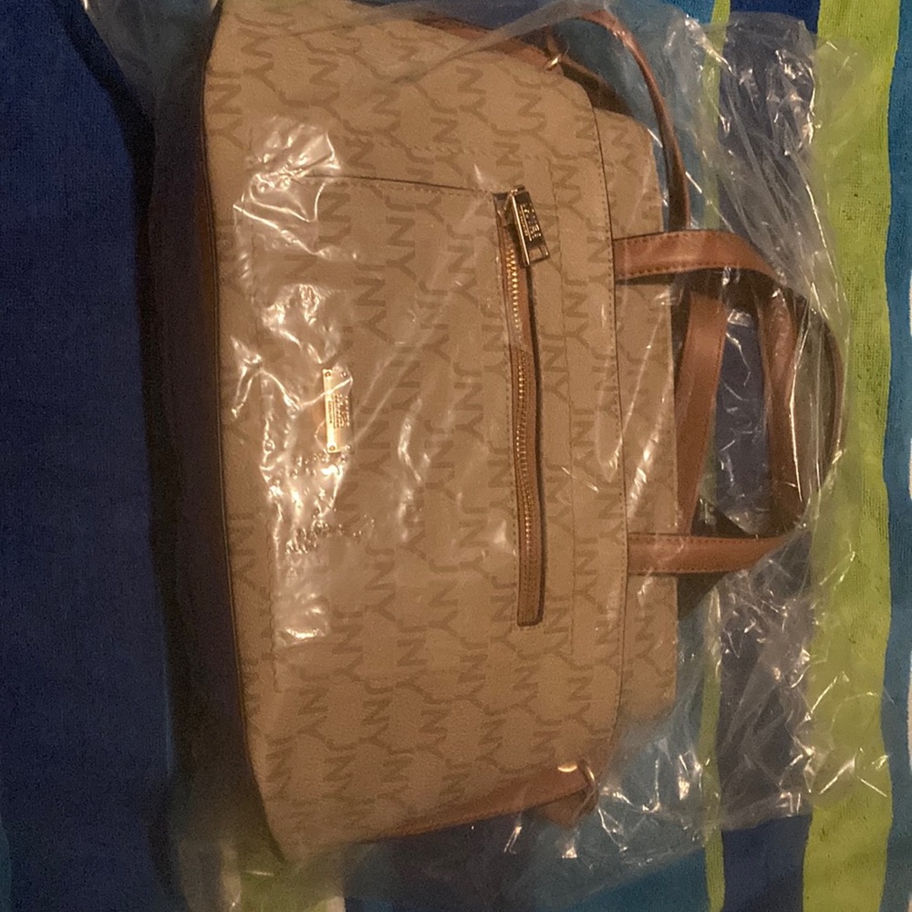16 inch brown cream colored Purse with over the shoulder straps and hand straps